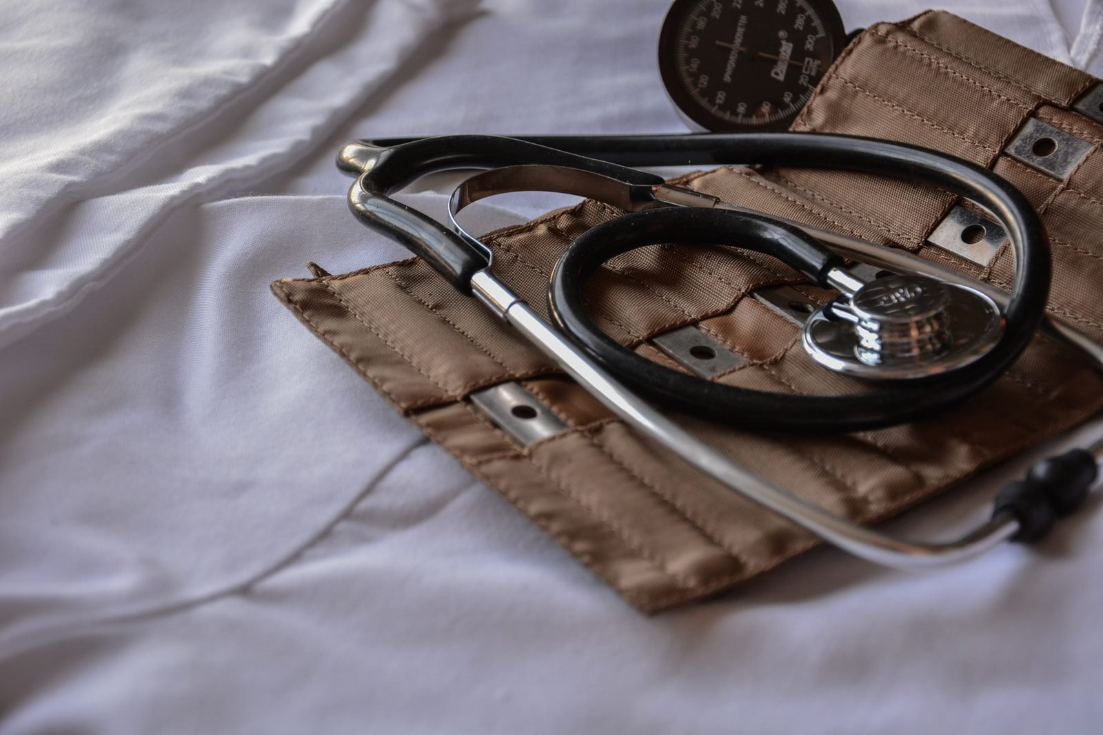Monoclonal antibody treatment combo reduces hospitalization among high-risk patients with COVID-19 black stethoscope with brown leather case