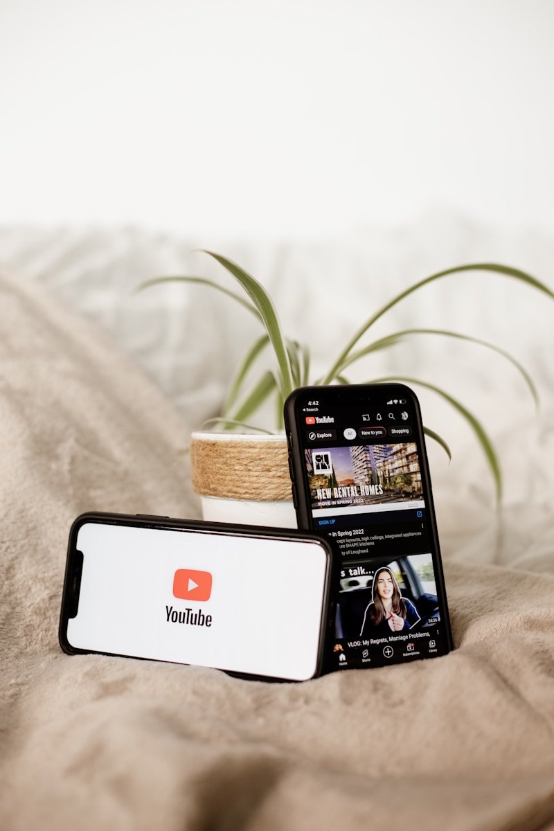 The Rise of the Micro-Influencer: Why Smaller Followings Can Have Bigger Impact a cell phone sitting on top of a bed next to a plant