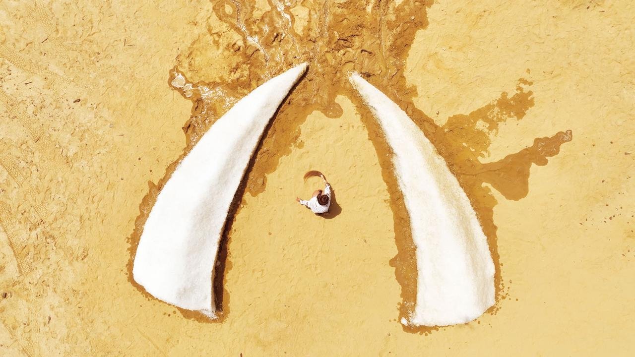 Young Siberian Artist Elena Tengri Creates Monumental Ice Sculpture in Egyptian Desert to Highlight Climate Crisis Elena Tengri